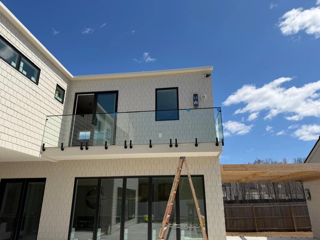 exterior 2nd-floor glass balcony railing