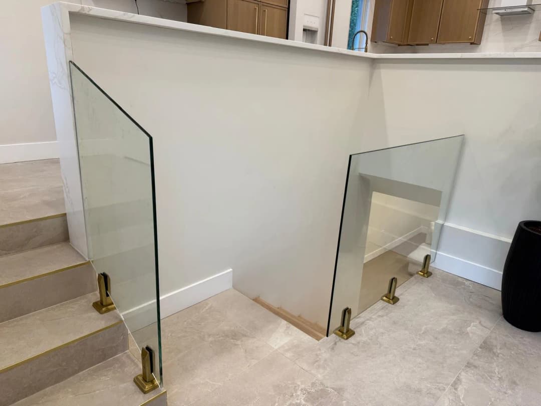 stair-landing glass guard, marble ledge