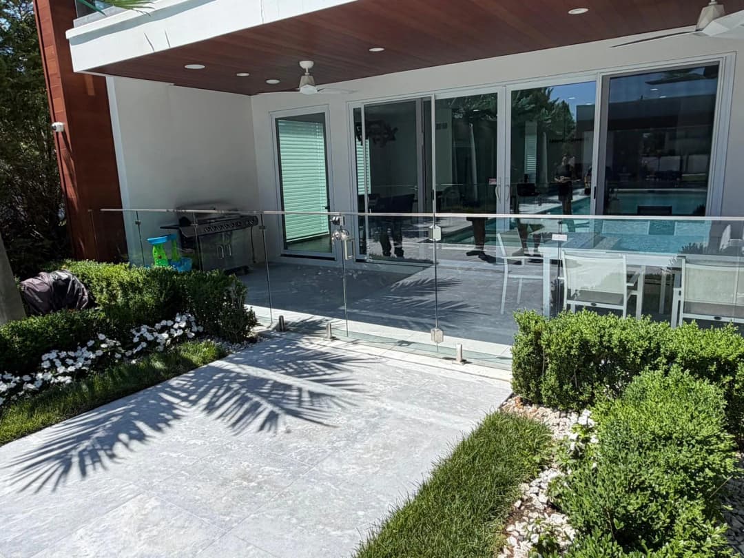 covered patio glass railing, pool view