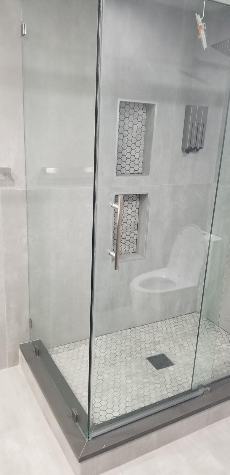 frameless slider, bright bathroom