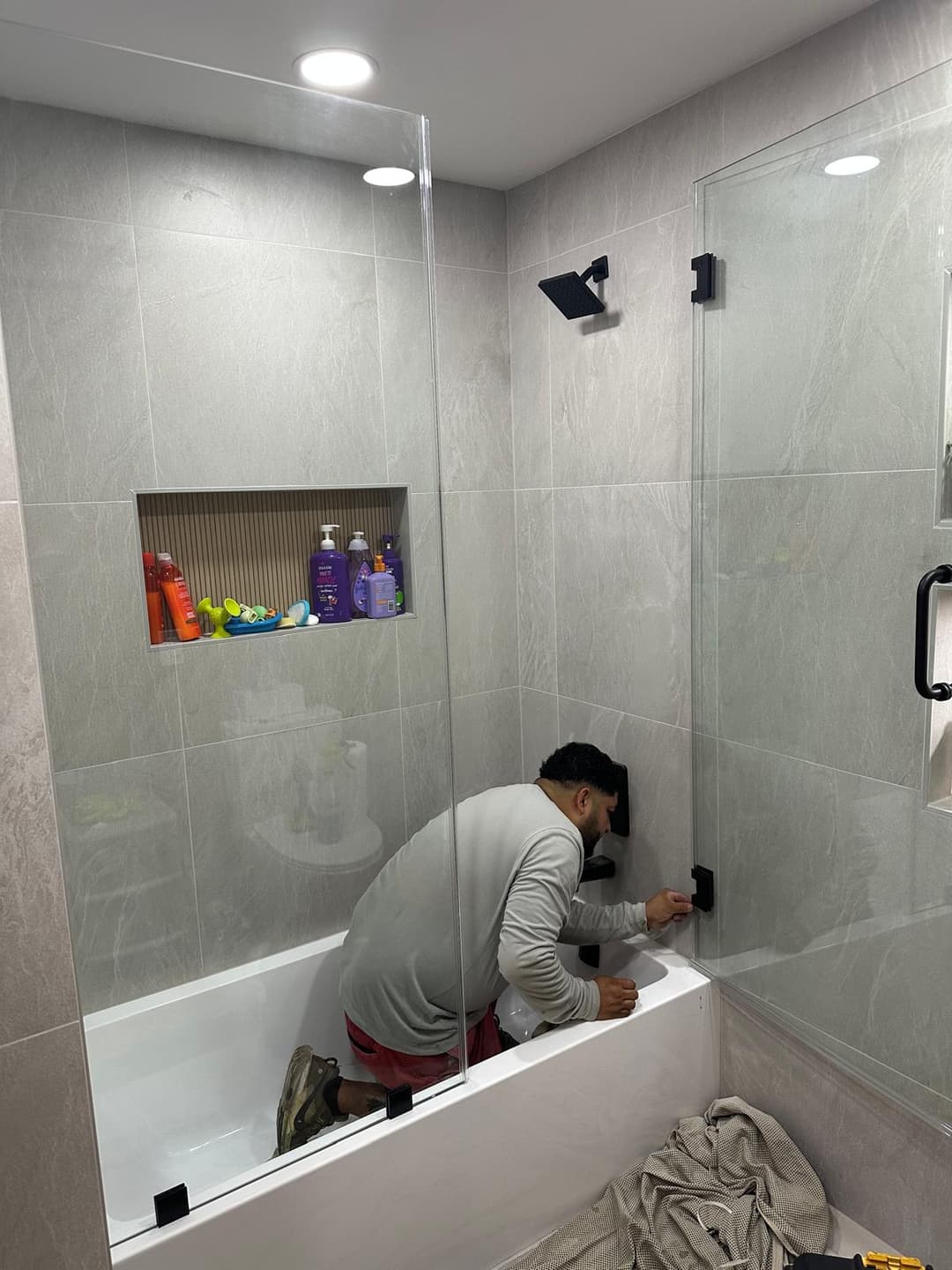 corner shower, hex tile floor