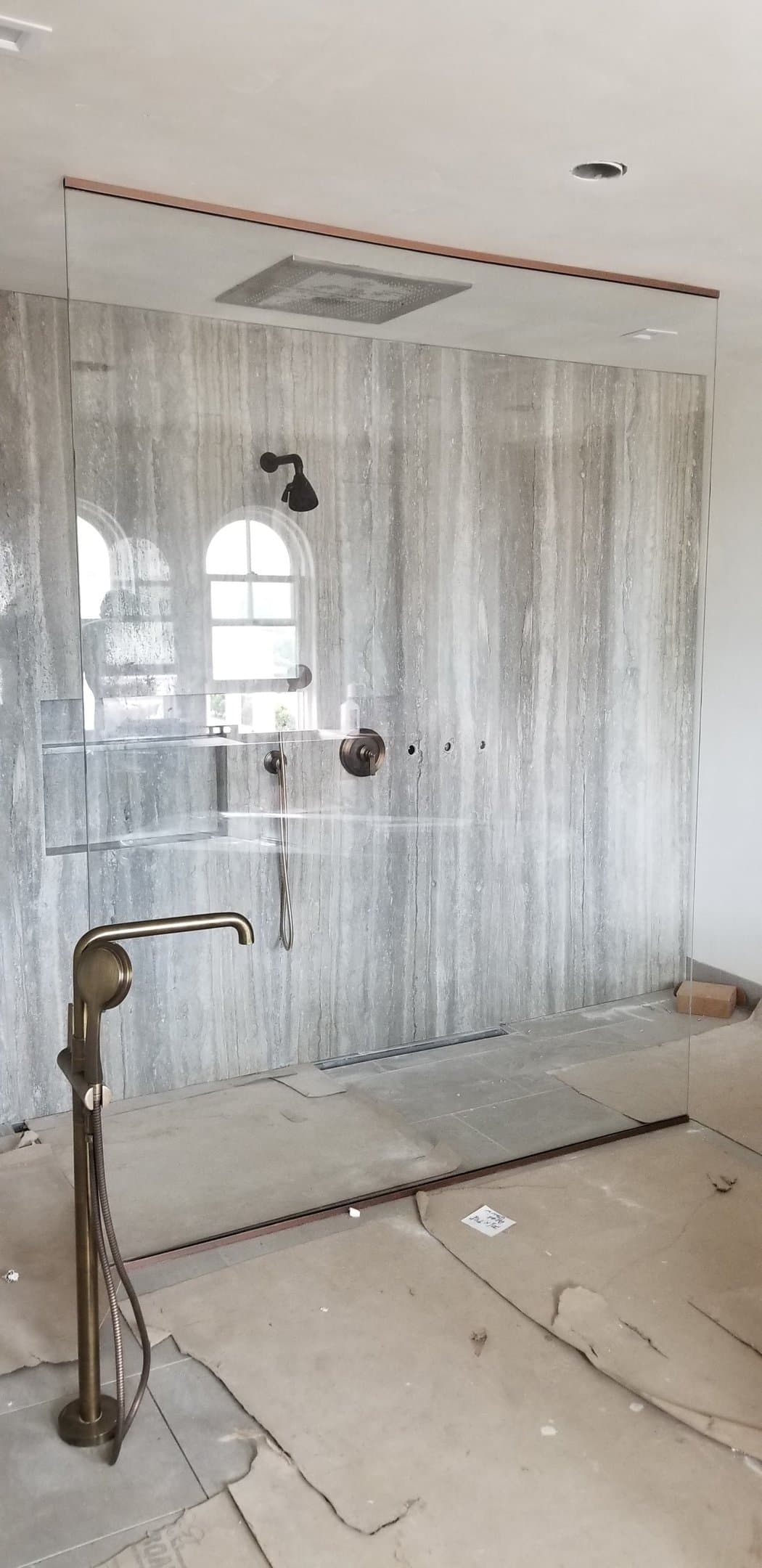 travertine shower, gold hardware (in-progress)