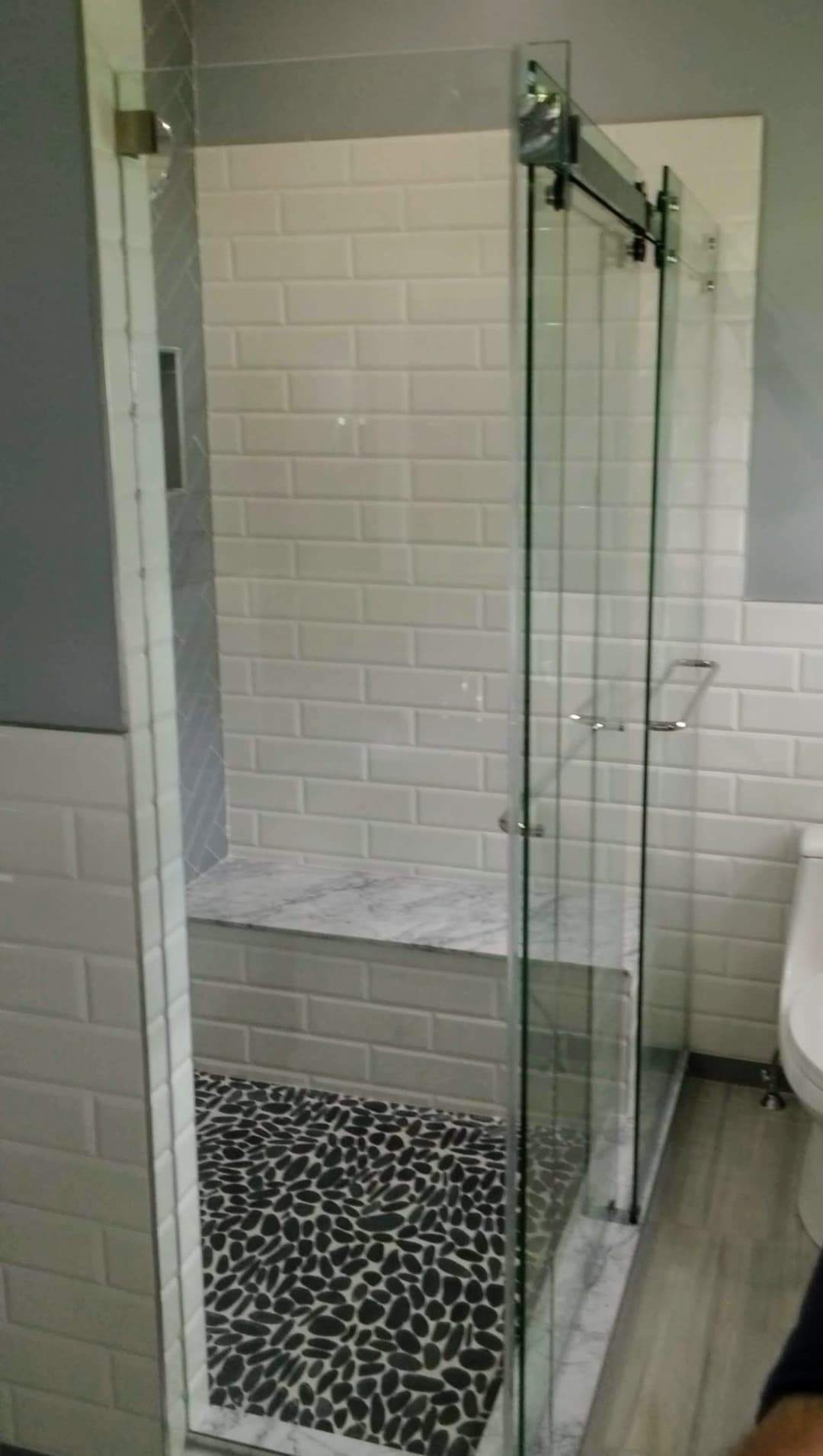 black/white sliding shower door, subway tile