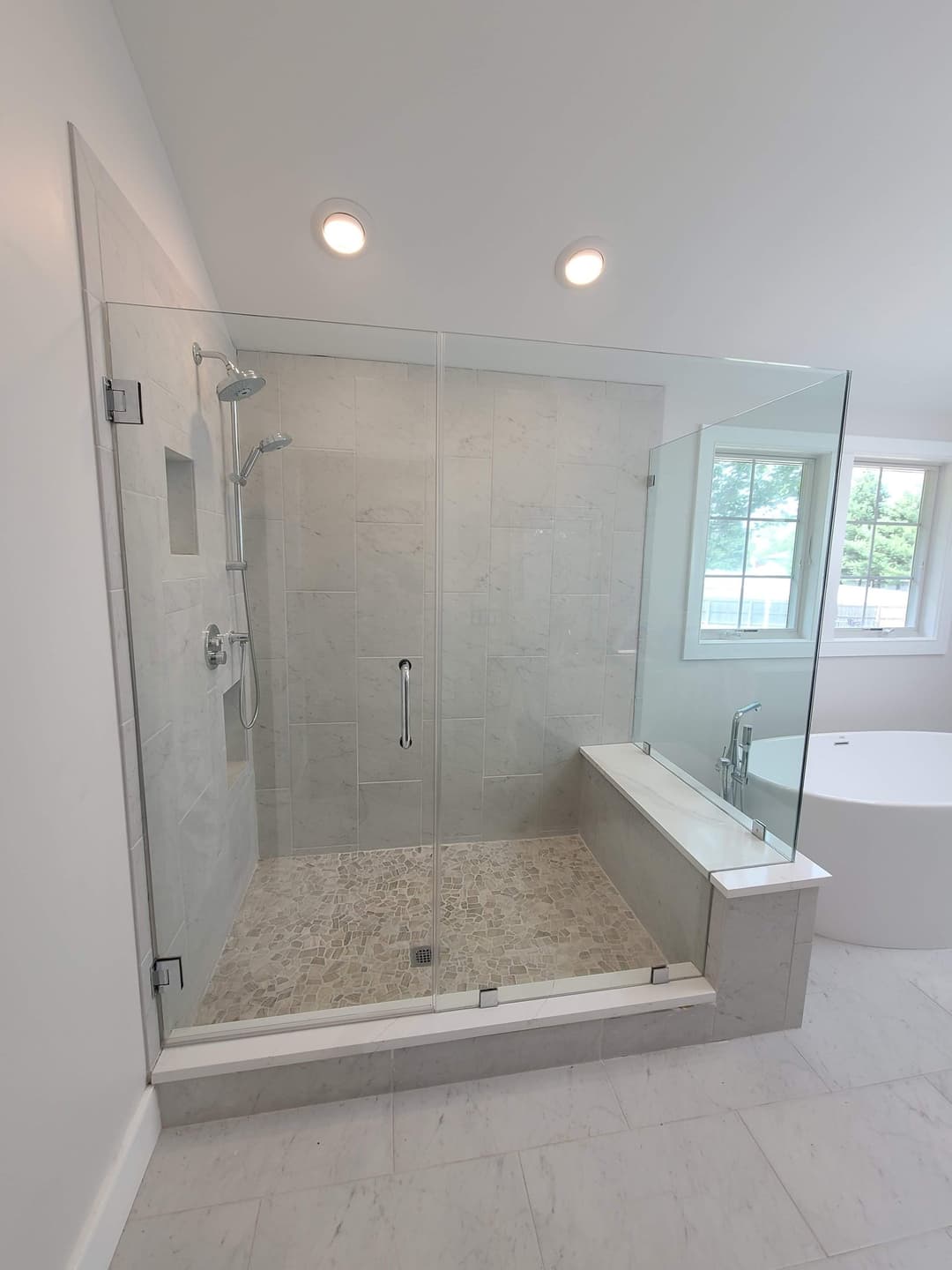 neo-angle shower, gray subway tile