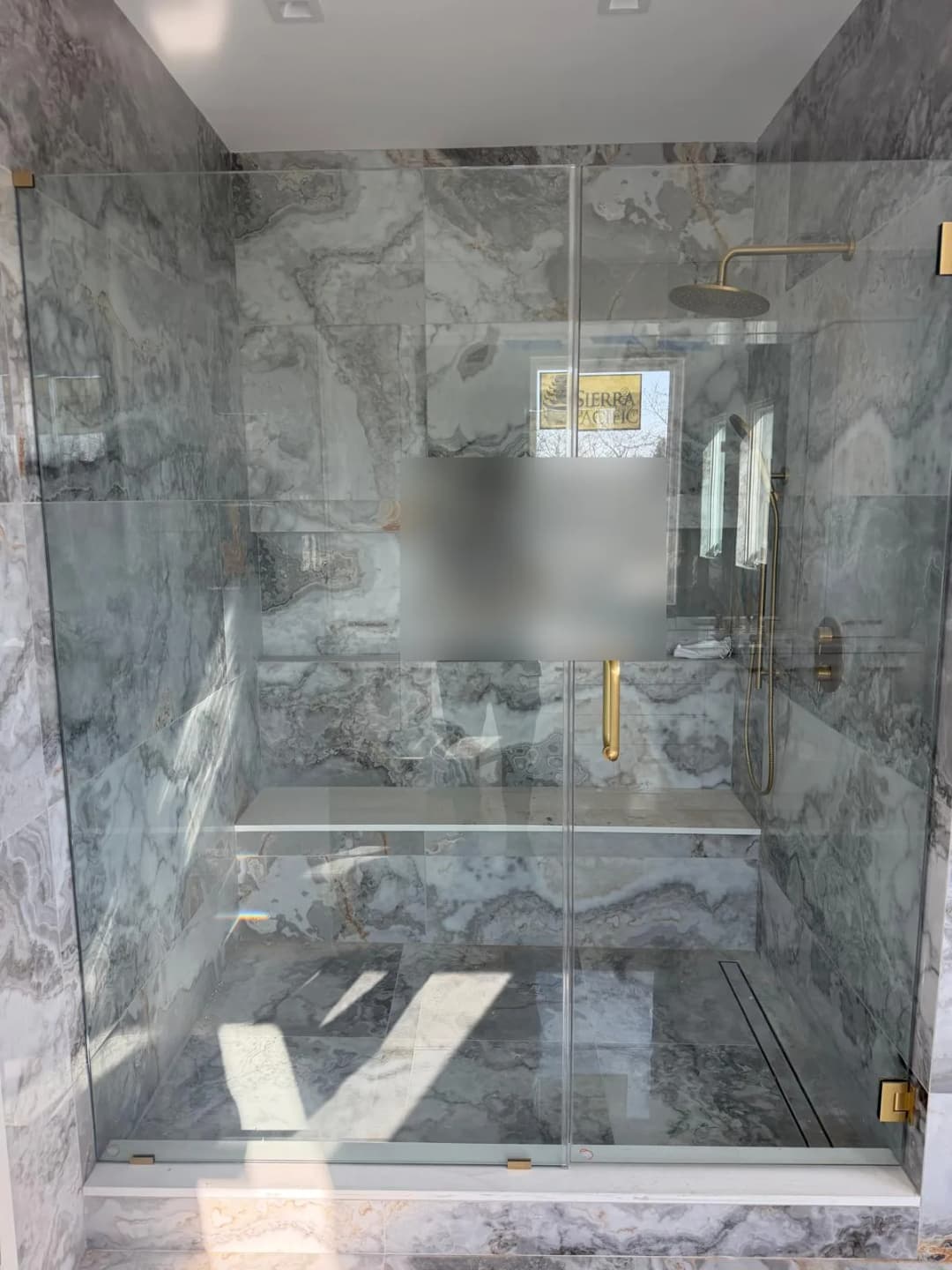 steam shower, gold hardware, bench