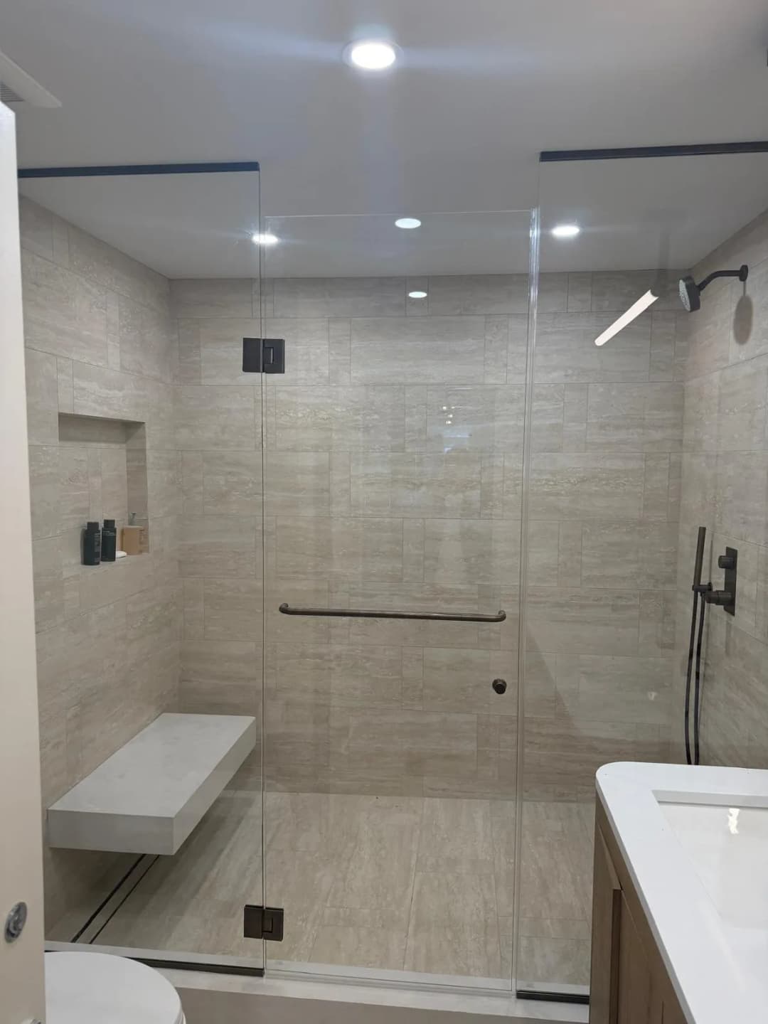 elegant walk-in shower, brushed nickel