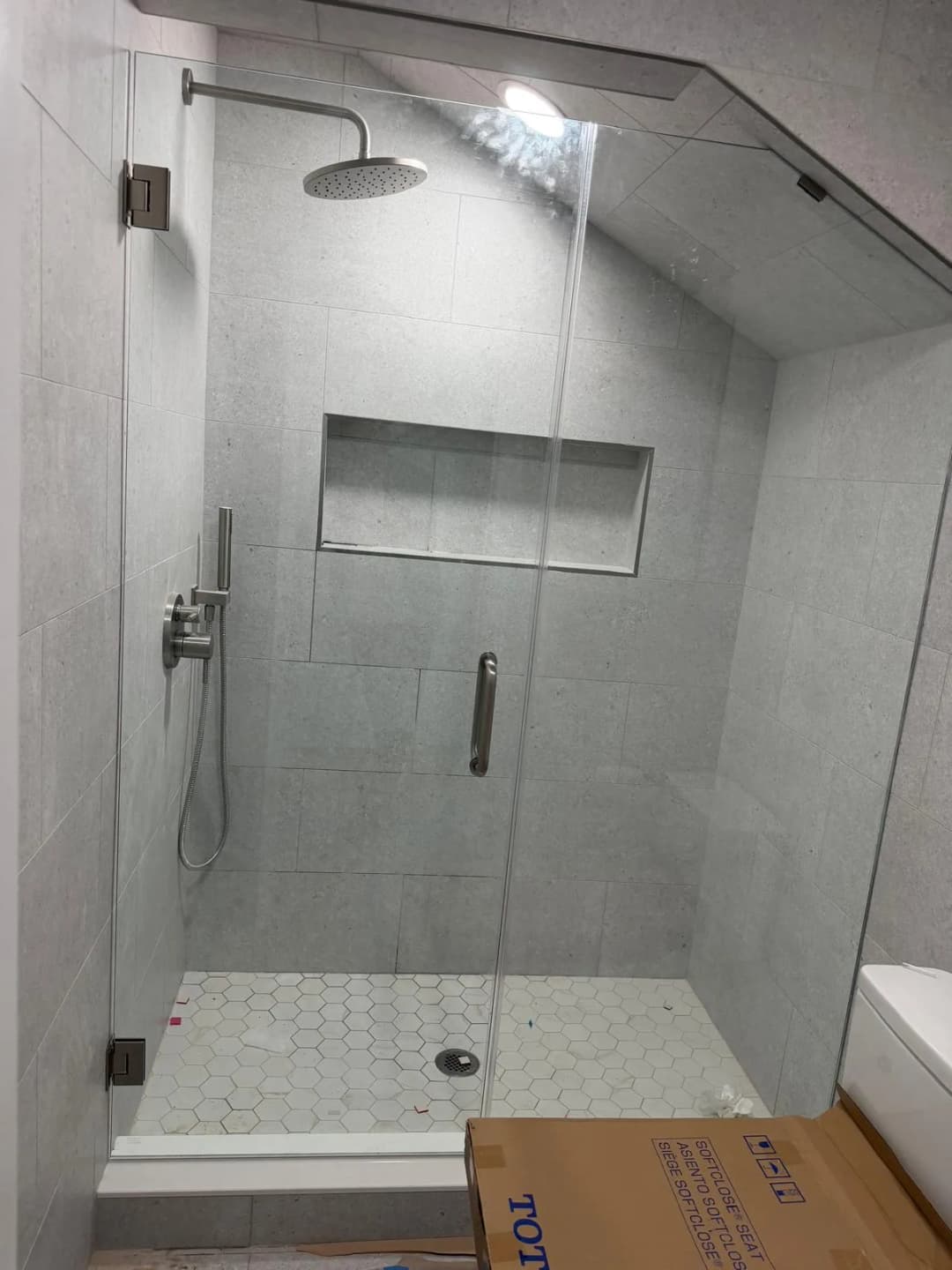 attic-style shower, sloped ceiling, hex tile