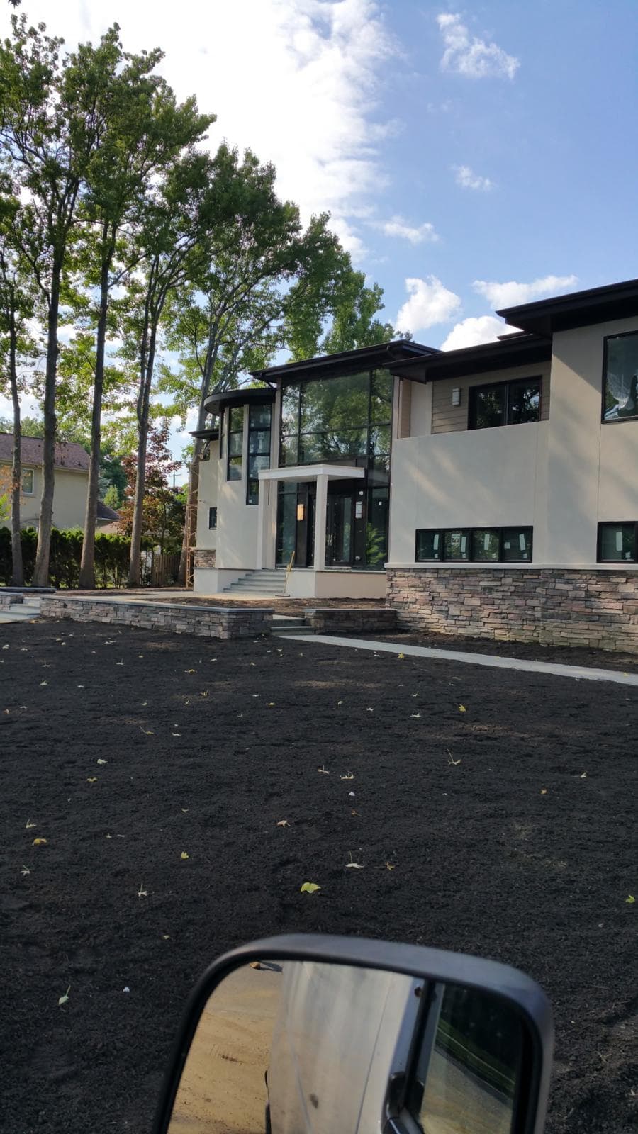 modern house glass curtain wall, car mirror obstruction