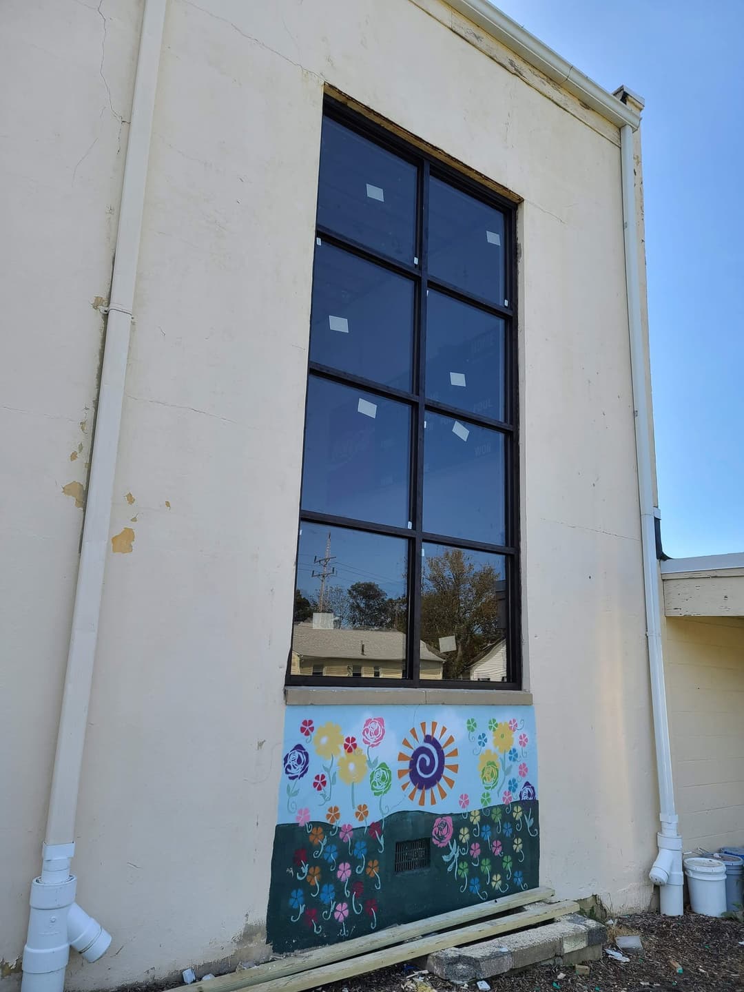 school exterior window + mural